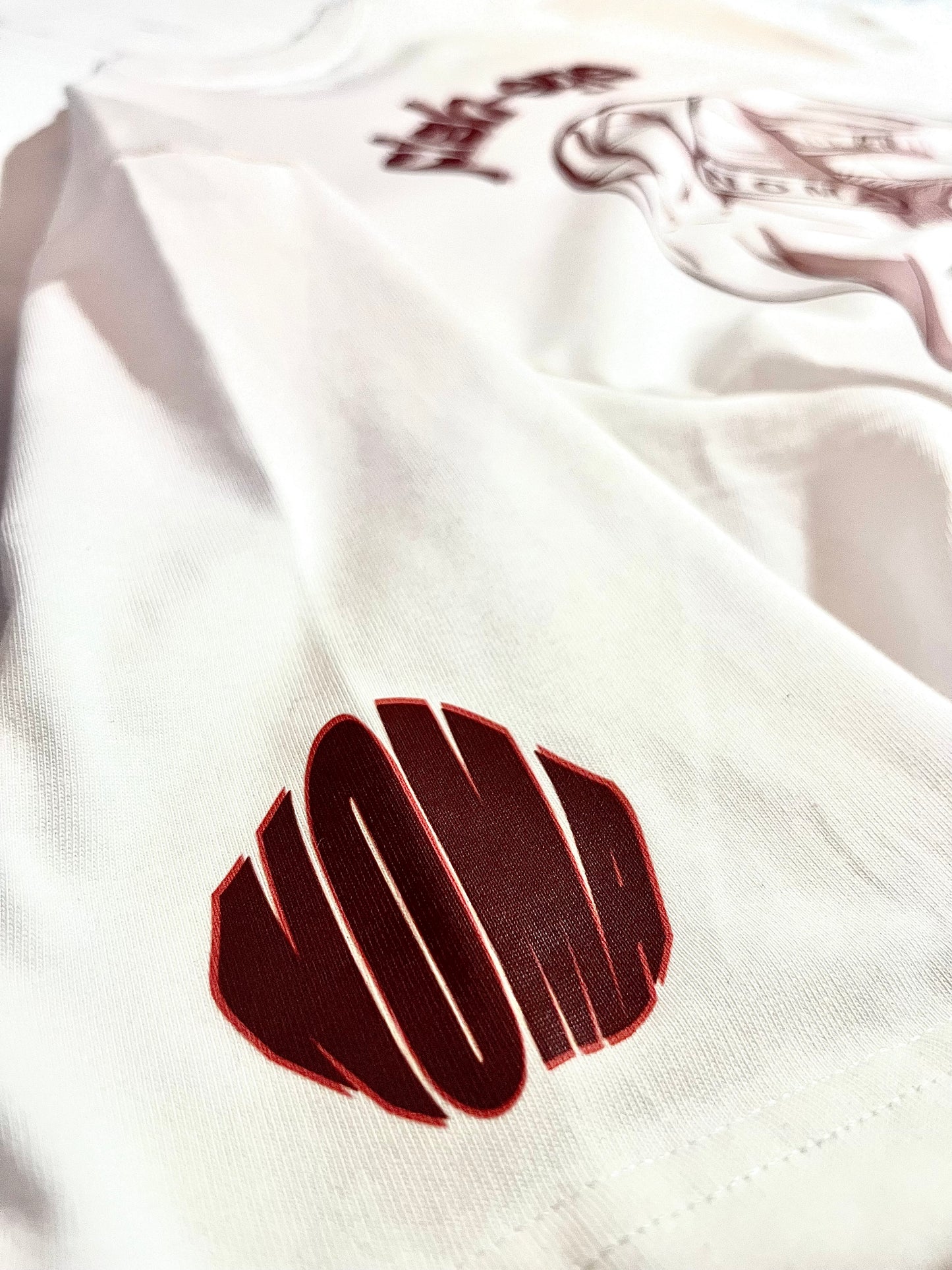 Tee-shirt oversize NOMA "Fish-eye lens" ring édition